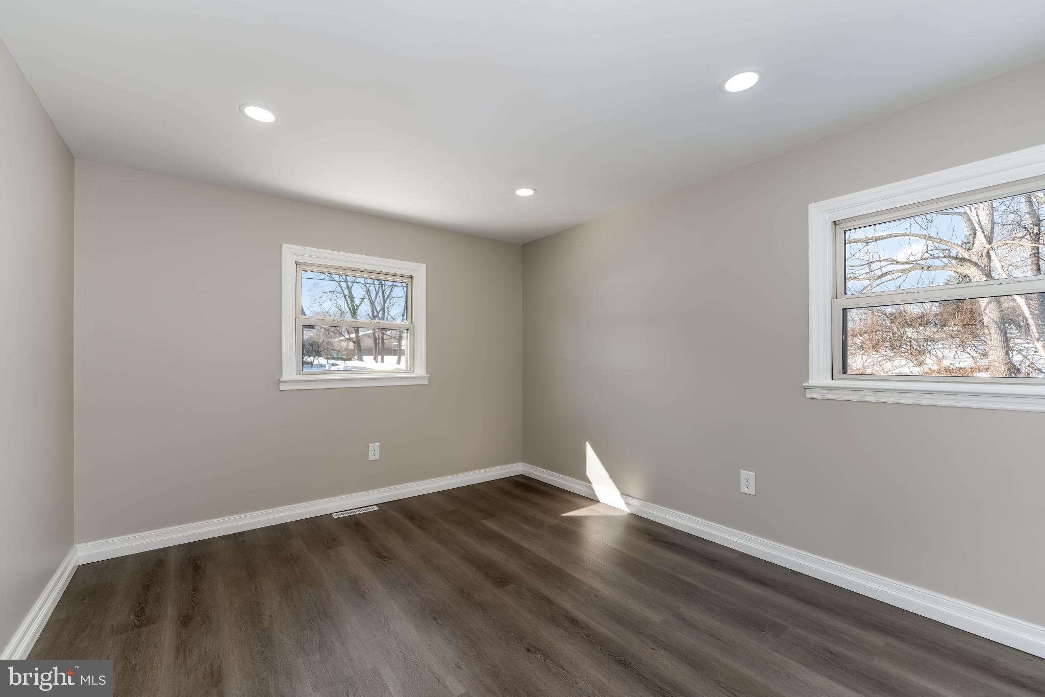 106 Rutherford Road Harrisburg, PA 17109 - Photo 16 of 27 a view of a big room with wooden floor and windows