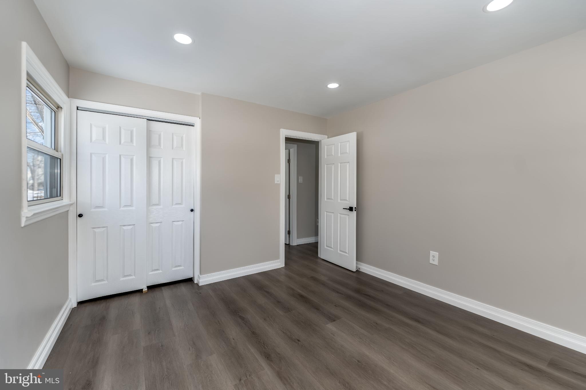 106 Rutherford Road Harrisburg, PA 17109 - Photo 17 of 27 a view of an empty room with wooden floor