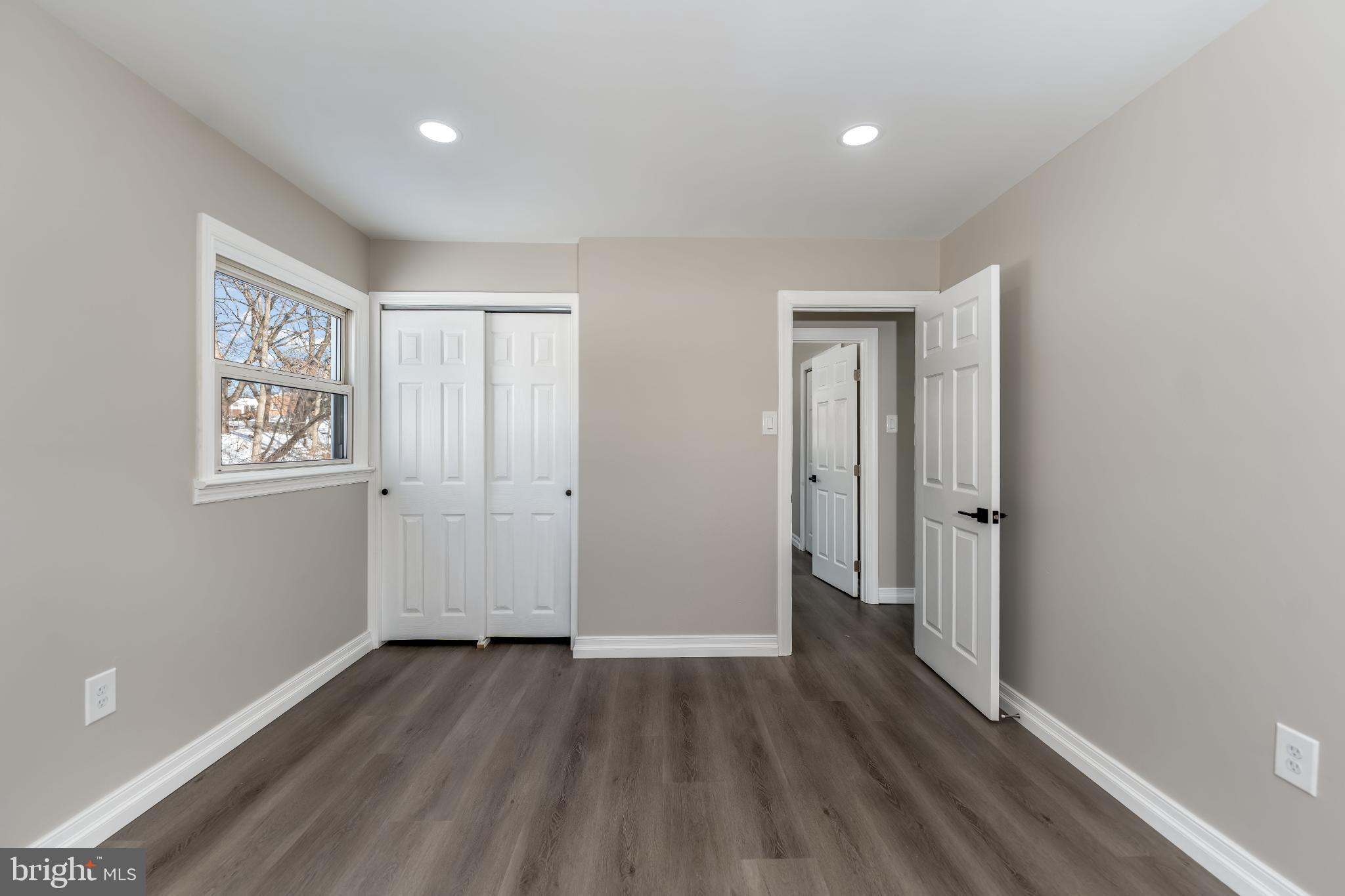 106 Rutherford Road Harrisburg, PA 17109 - Photo 18 of 27 a view of a room with wooden floor and window