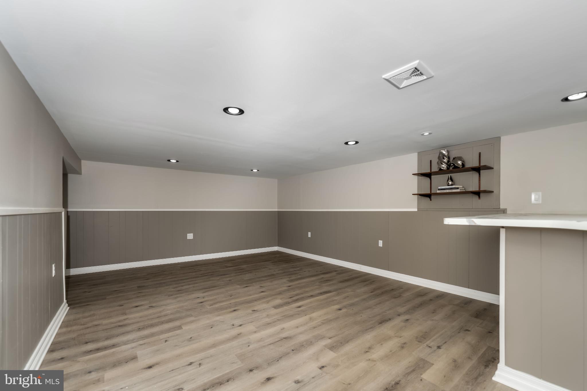 106 Rutherford Road Harrisburg, PA 17109 - Photo 23 of 27 a view of empty room with wooden floor