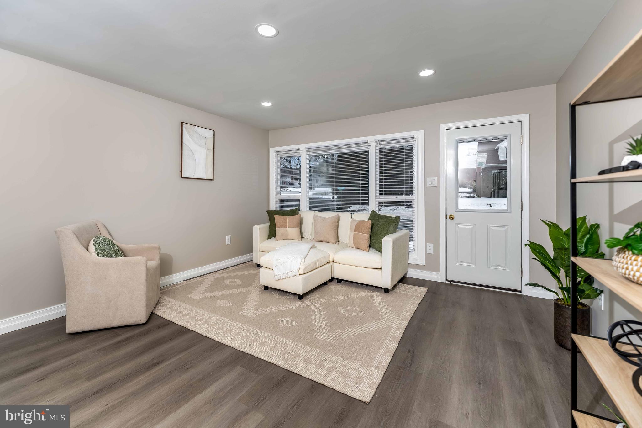 106 Rutherford Road Harrisburg, PA 17109 - Photo 7 of 27 a living room with furniture and a large window