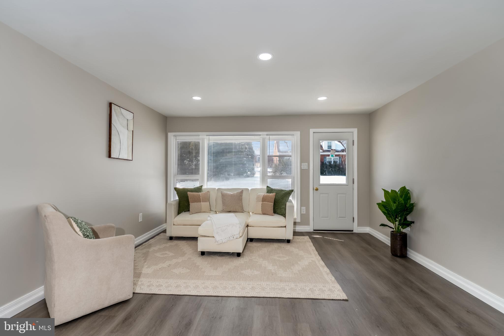 106 Rutherford Road Harrisburg, PA 17109 - Photo 8 of 27 a living room with furniture and wooden floor