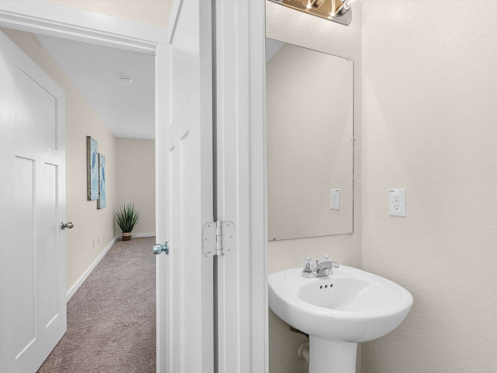 21155 Gosling Road, Unit 31B Spring, TX 77388 - Photo 16 of 36 a bathroom with a sink and a mirror