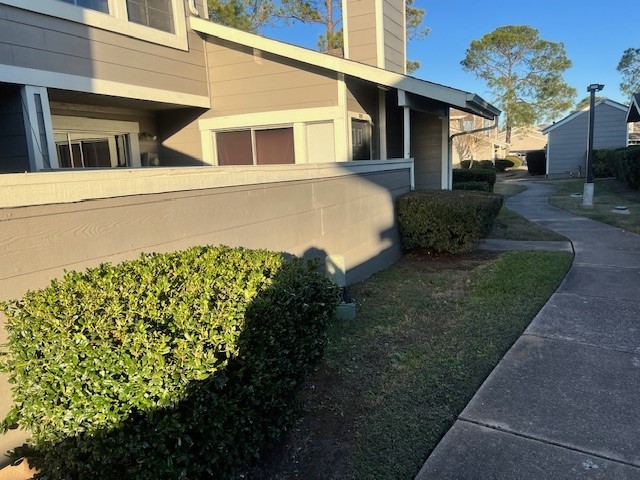 12245 Lemon Ridge Lane, Unit 122 Houston, TX 77035 - Photo 15 of 26 a view of a house with a yard