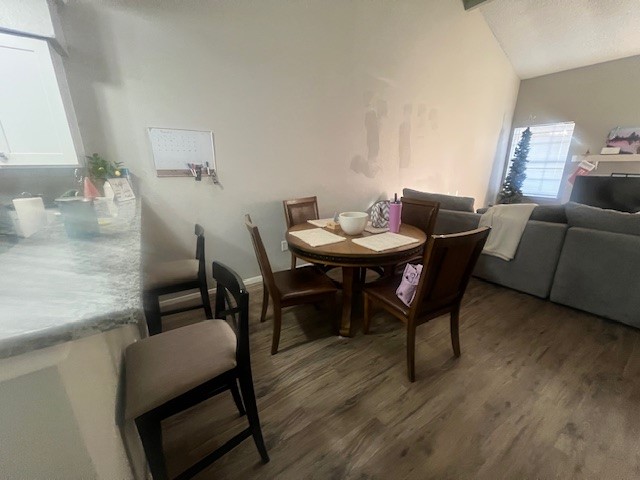 12245 Lemon Ridge Lane, Unit 122 Houston, TX 77035 - Photo 19 of 26 a view of a dining room with furniture and wooden floor