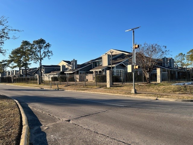 12245 Lemon Ridge Lane, Unit 122 Houston, TX 77035 - Photo 5 of 26 a front view of a house with a ocean view