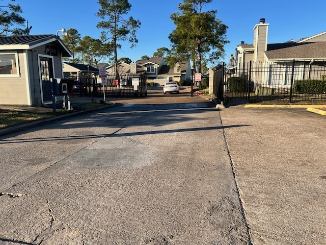 12245 Lemon Ridge Lane, Unit 122 Houston, TX 77035 - Photo 6 of 26 a front view of a building with street view