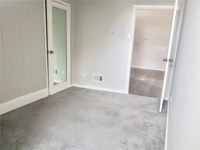 an empty room with an entryway