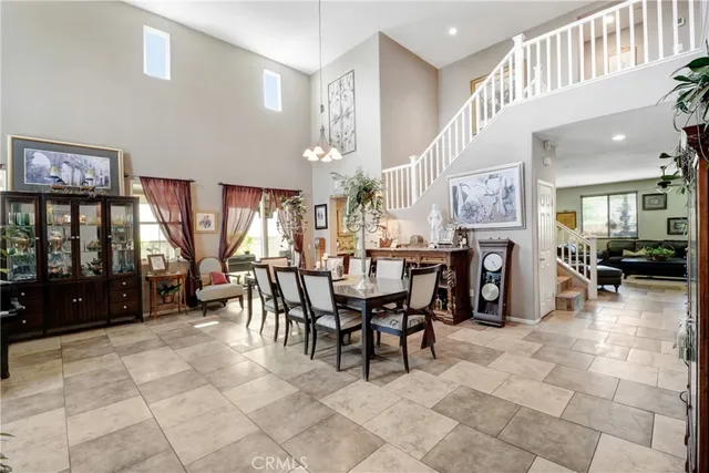 a view of a house with yard porch and furniture