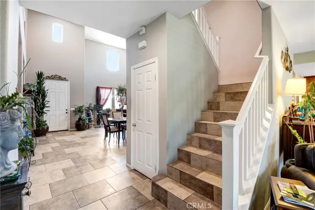 a kitchen with stainless steel appliances granite countertop a refrigerator stove and sink