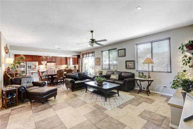 a kitchen with a sink appliances and cabinets