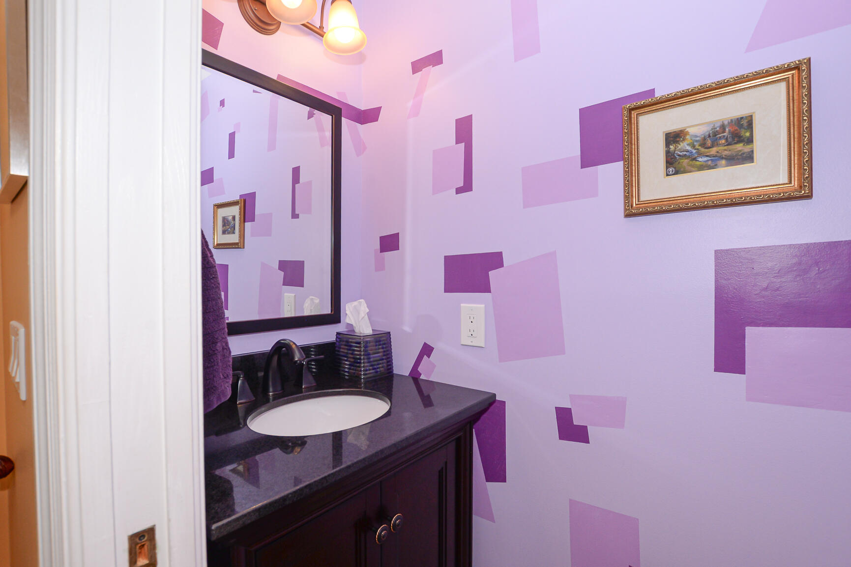 3068 Southeast Darien Road Port St. Lucie, FL 34952 - Photo 14 of 54 a bathroom with a sink and mirror