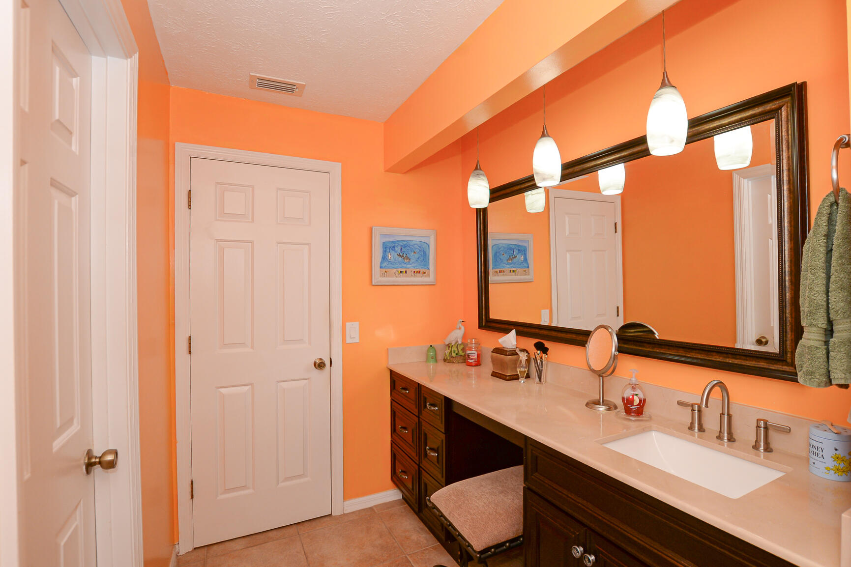 3068 Southeast Darien Road Port St. Lucie, FL 34952 - Photo 28 of 54 a bathroom with a sink and a mirror