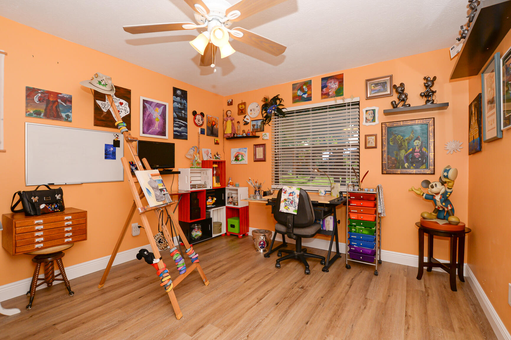 3068 Southeast Darien Road Port St. Lucie, FL 34952 - Photo 36 of 54 a work room with furniture and a wooden floor