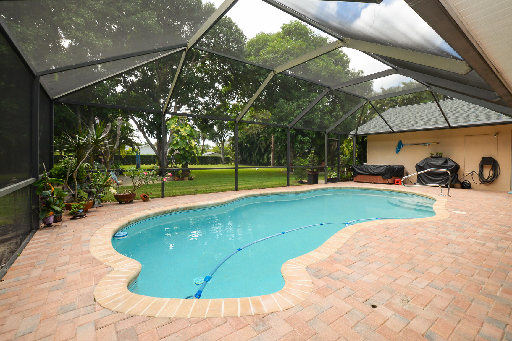 3068 Southeast Darien Road Port St. Lucie, FL 34952 - Photo 40 of 54 a view of a backyard