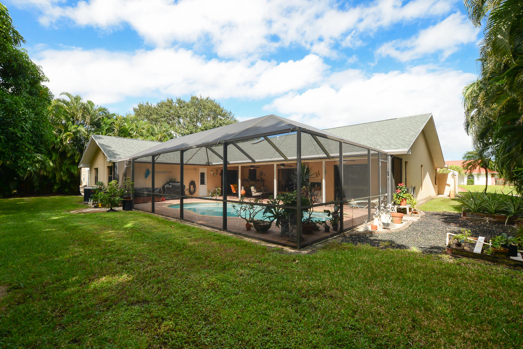 3068 Southeast Darien Road Port St. Lucie, FL 34952 - Photo 44 of 54 a view of a house with backyard
