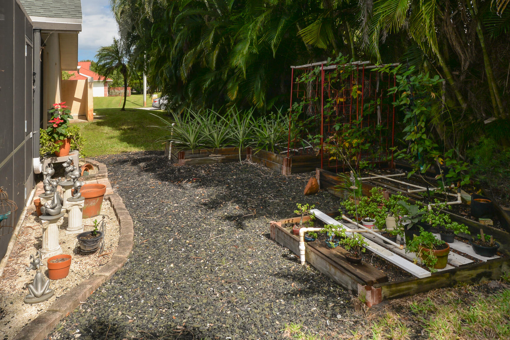 3068 Southeast Darien Road Port St. Lucie, FL 34952 - Photo 45 of 54 a view of outdoor space with garden