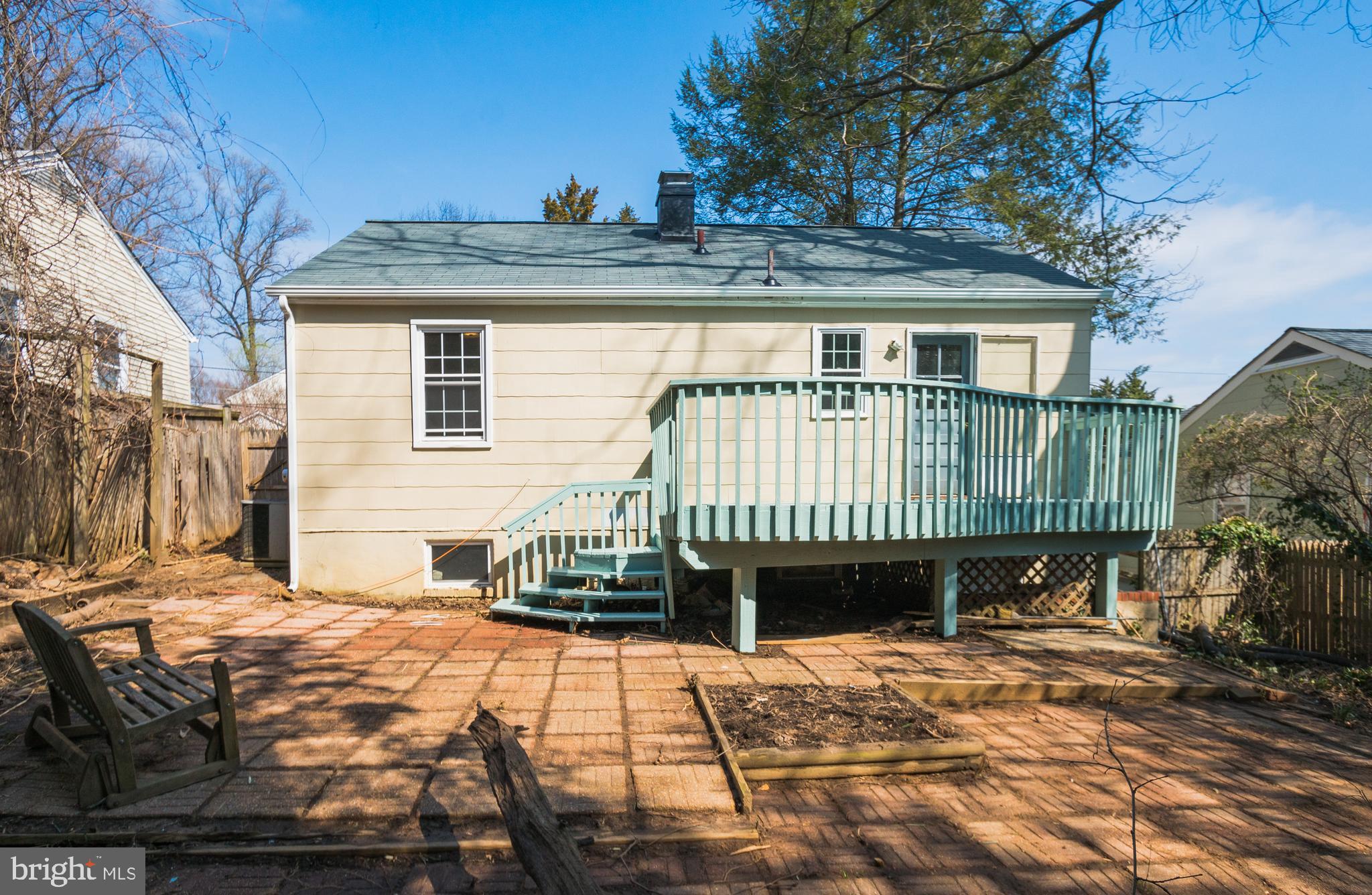 3404 Murdock Road Kensington, MD 20895 - Photo 22 of 24 a front view of a house with a yard
