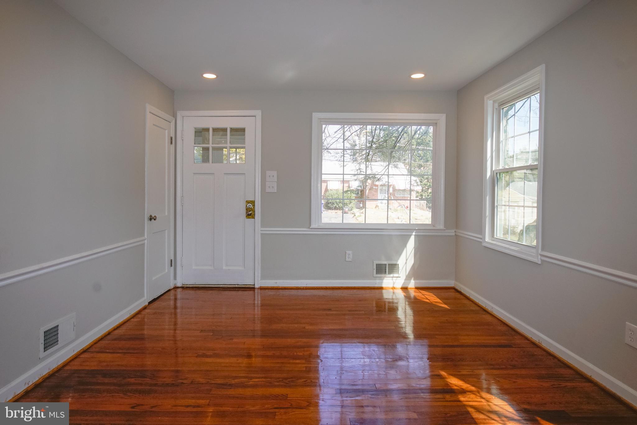 3404 Murdock Road Kensington, MD 20895 - Photo 5 of 24 a view of empty room with wooden floor and fan