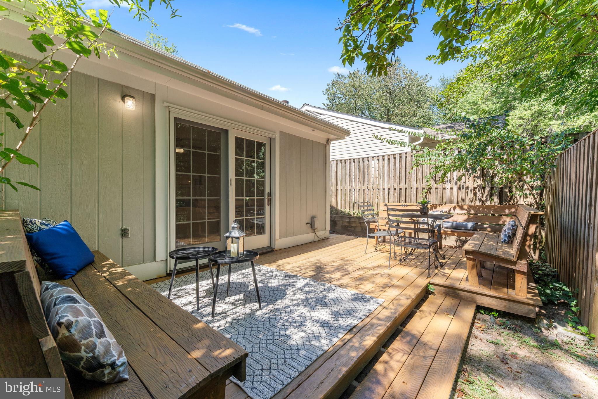11401 Turnmill Lane Reston, VA 20191 - Photo 12 of 81 Charming outdoor retreat with cozy seating.