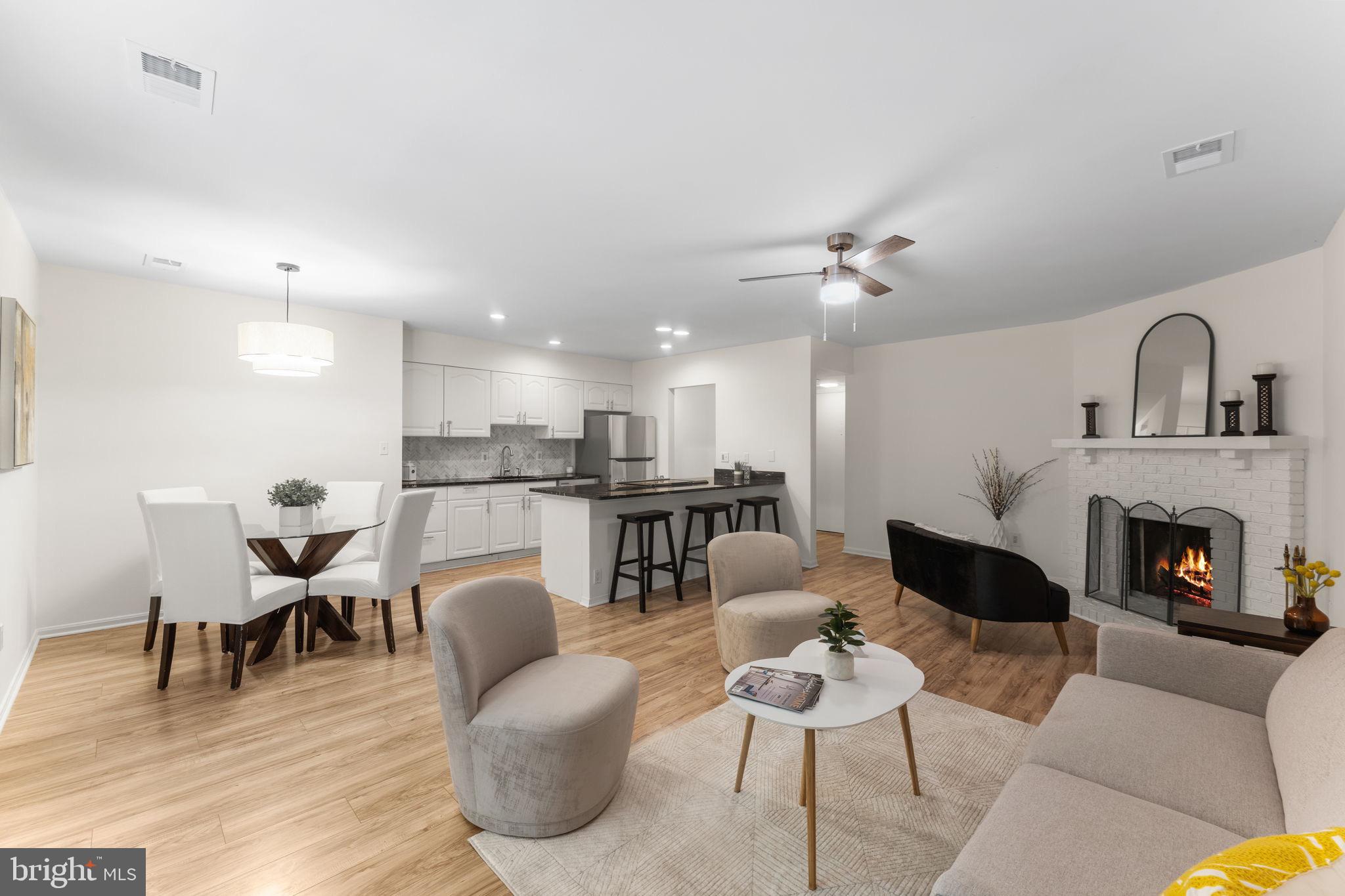 11401 Turnmill Lane Reston, VA 20191 - Photo 15 of 81 a living room with furniture and a fireplace