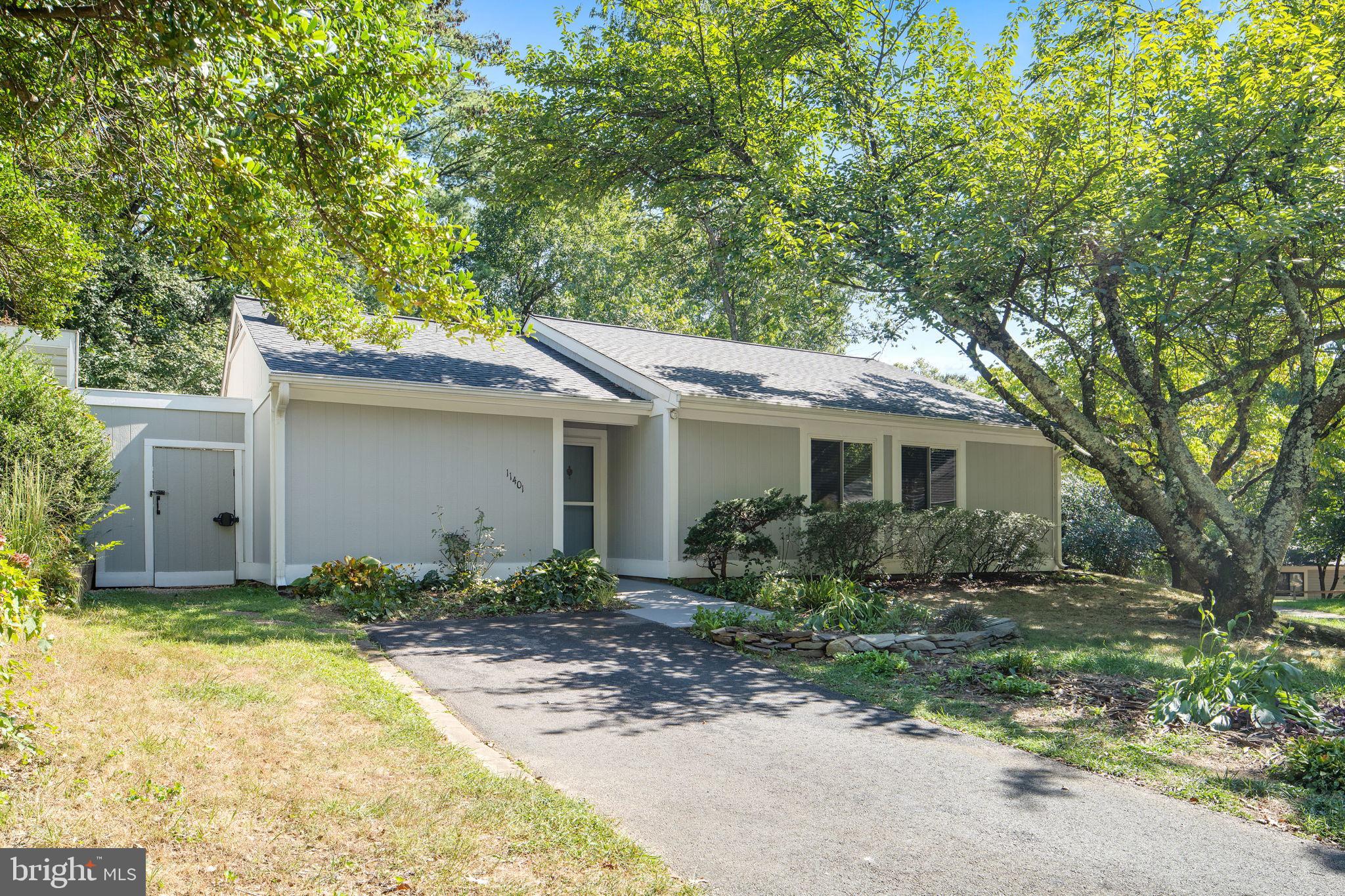 11401 Turnmill Lane Reston, VA 20191 - Photo 2 of 81 a view of a house with yard and plants