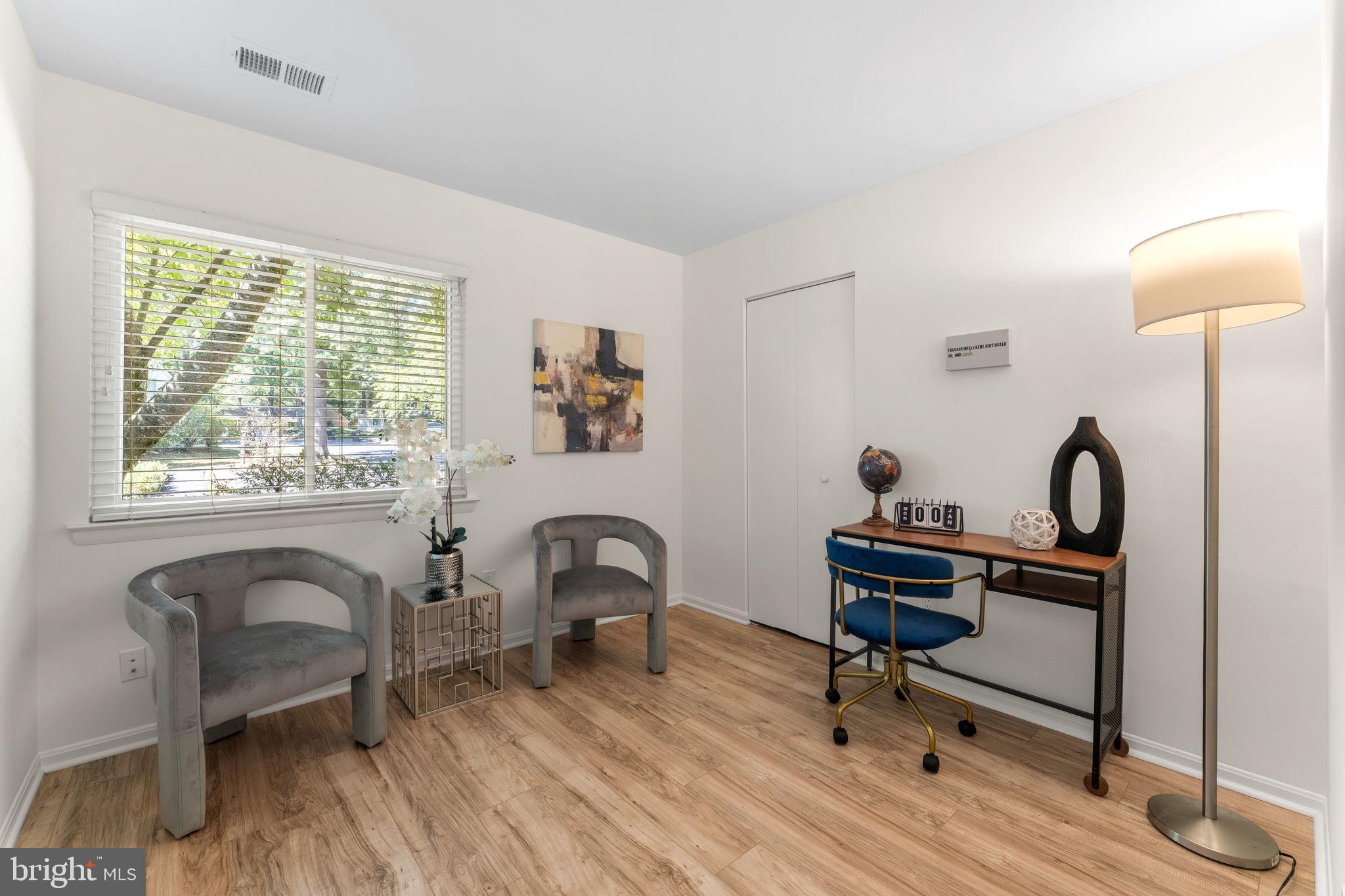 11401 Turnmill Lane Reston, VA 20191 - Photo 35 of 81 a living room with furniture and a window