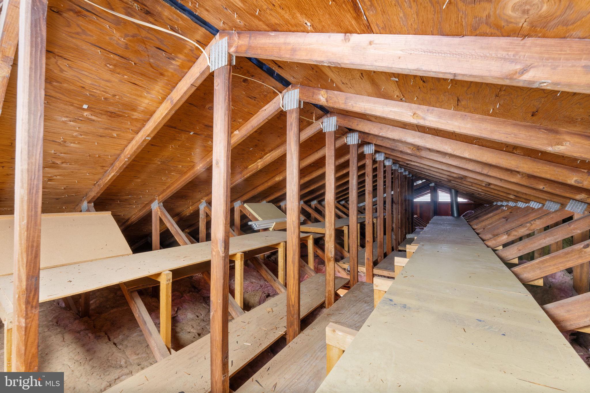 11401 Turnmill Lane Reston, VA 20191 - Photo 42 of 81 Spacious attic with shelving for storage..