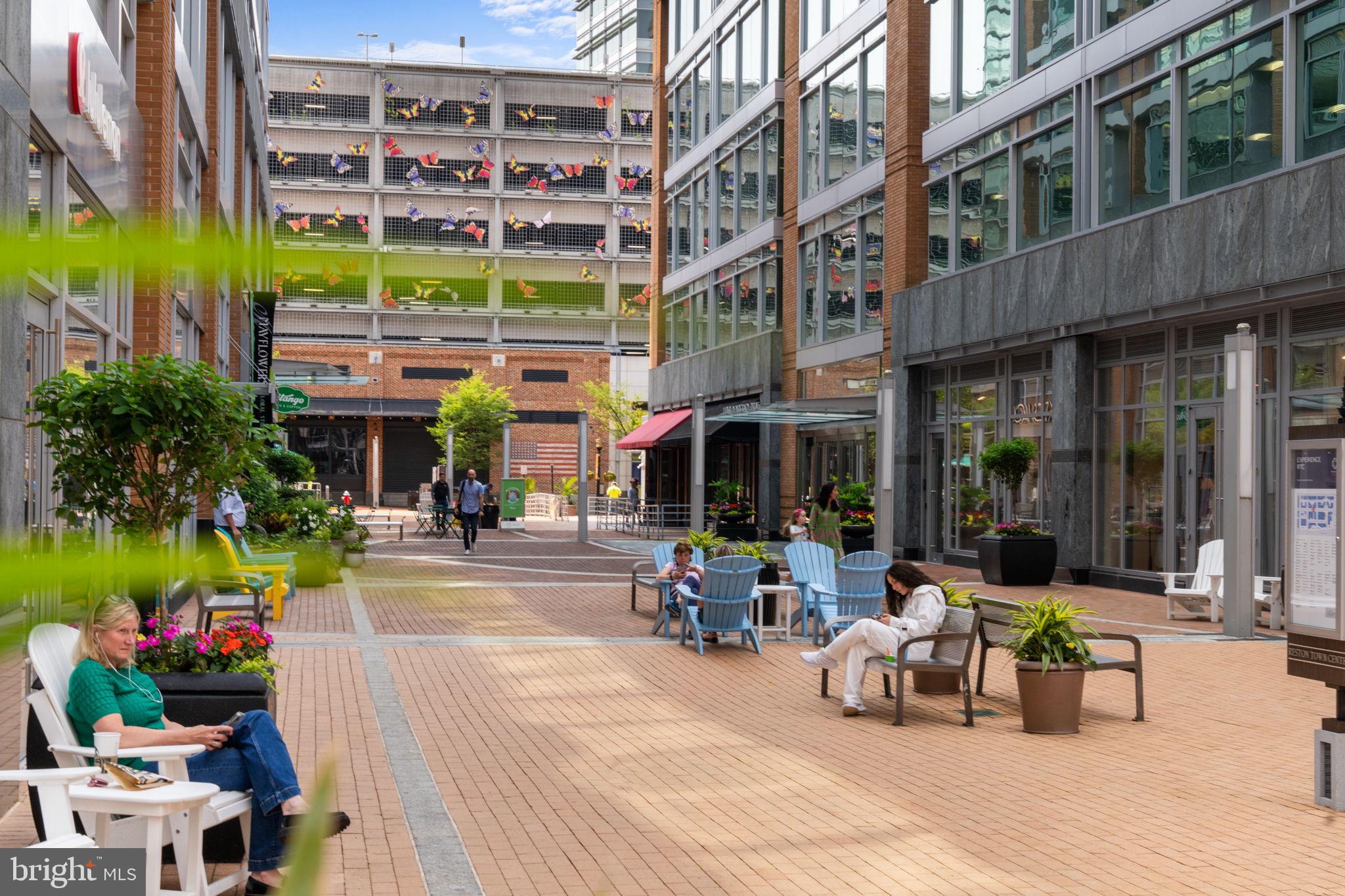 11401 Turnmill Lane Reston, VA 20191 - Photo 69 of 81 Charming urban plaza with vibrant greenery.