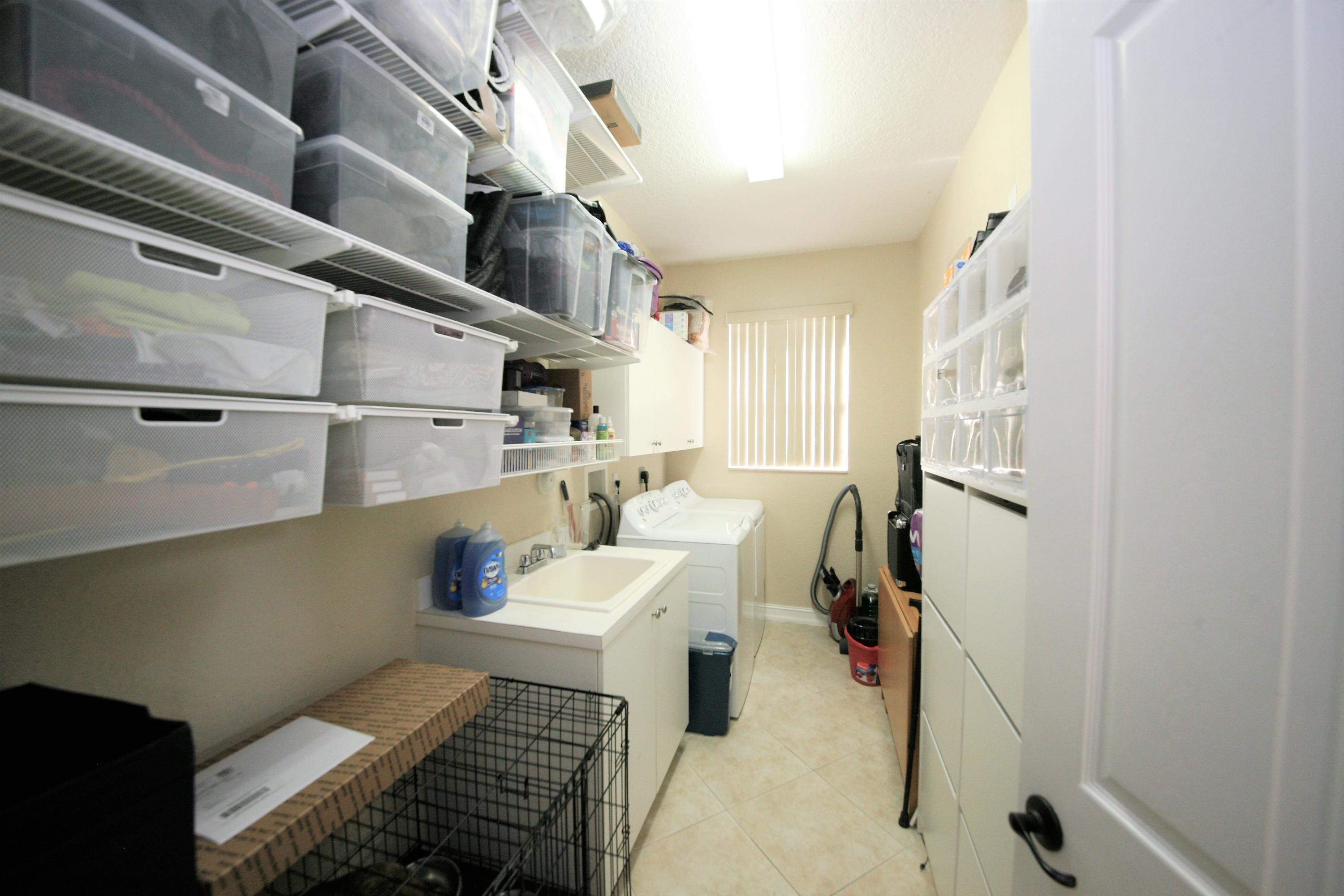 8919 Chestnut Ridge Way Boynton Beach, FL 33473 - Photo 17 of 42 Laundry Room