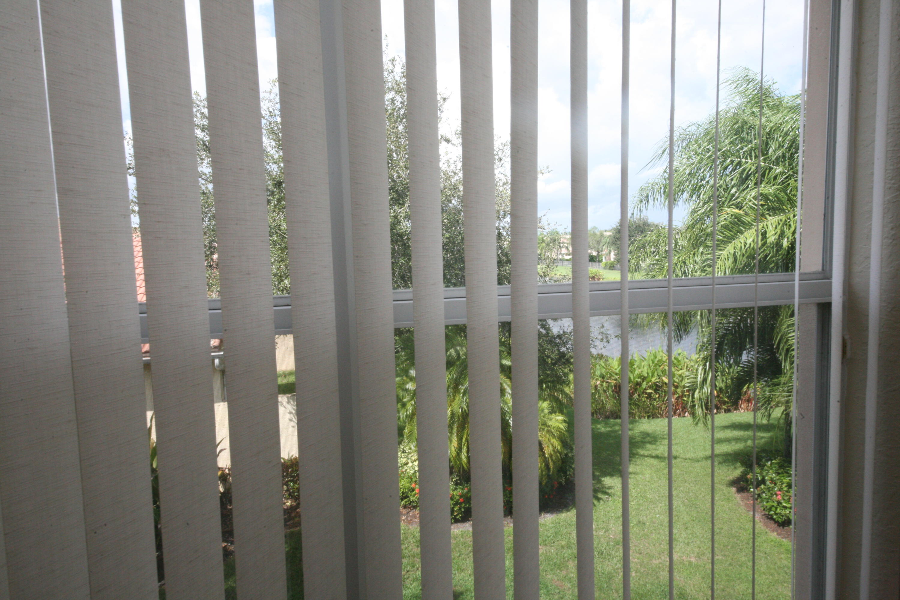 8919 Chestnut Ridge Way Boynton Beach, FL 33473 - Photo 30 of 42 Bedroom View of Lake with Fountain