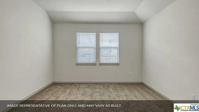 a view of a room that has a window