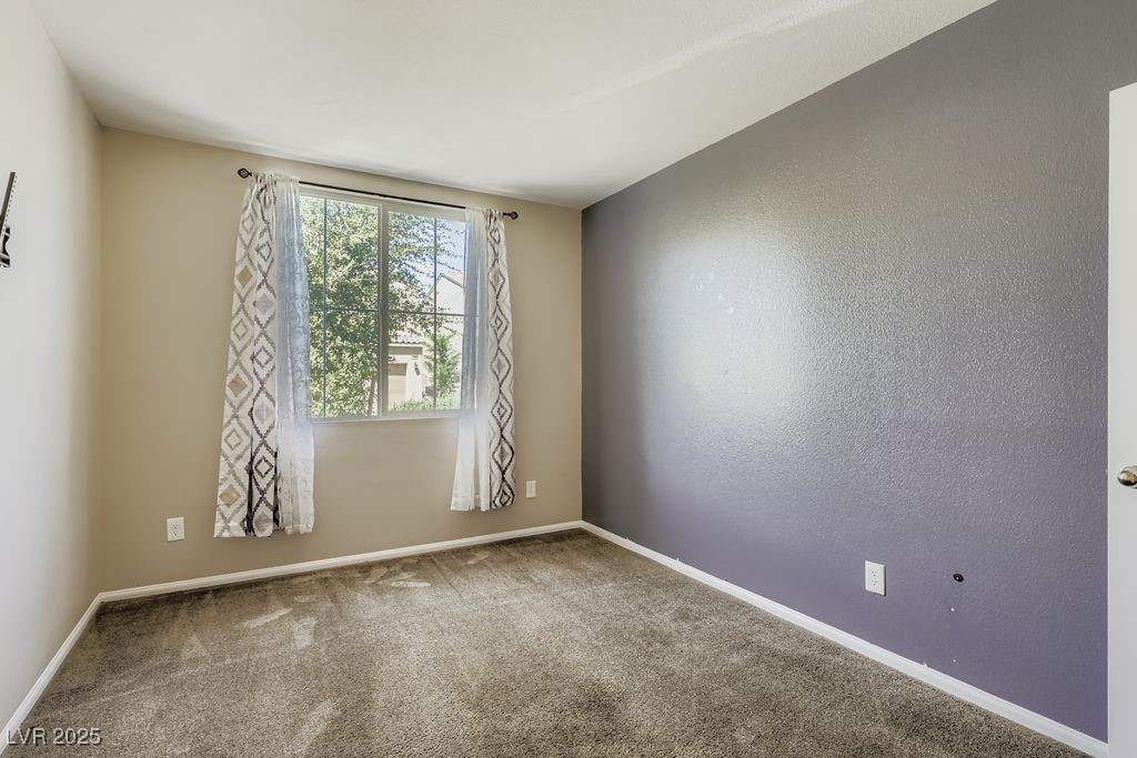 5712 Wishing Coin Court North Las Vegas, NV 89031 - Photo 14 of 24 Downstairs bedroom