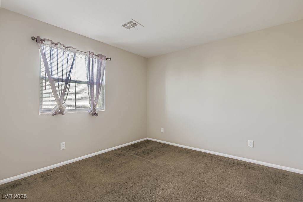 5712 Wishing Coin Court North Las Vegas, NV 89031 - Photo 18 of 24 Upstairs bedroom
