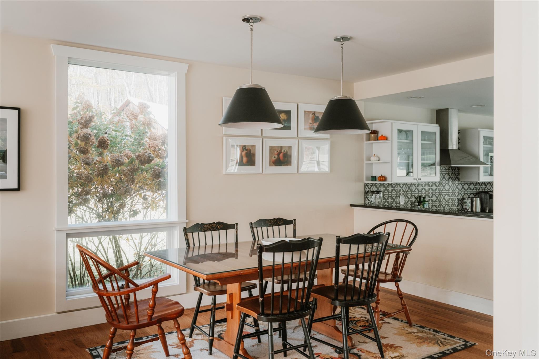 7775 State Rte 55 Neversink, NY 12765 - Photo 11 of 46 a view of a dining room with furniture window and wooden floor