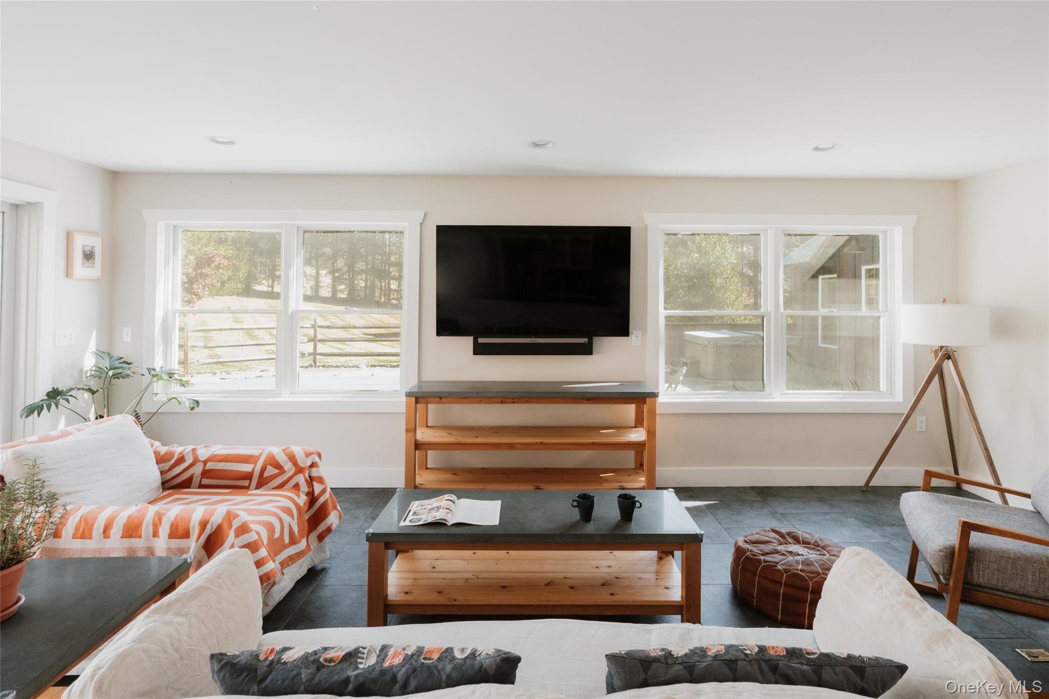 7775 State Rte 55 Neversink, NY 12765 - Photo 15 of 46 a living room with furniture and a flat screen tv