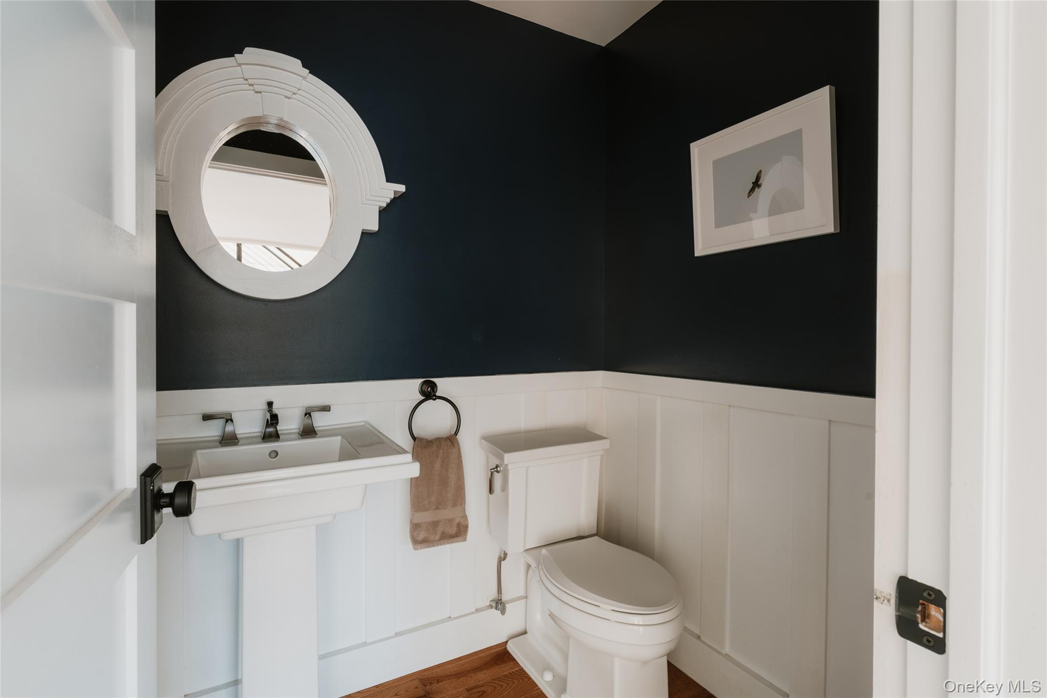7775 State Rte 55 Neversink, NY 12765 - Photo 17 of 46 a bathroom with a sink and a mirror