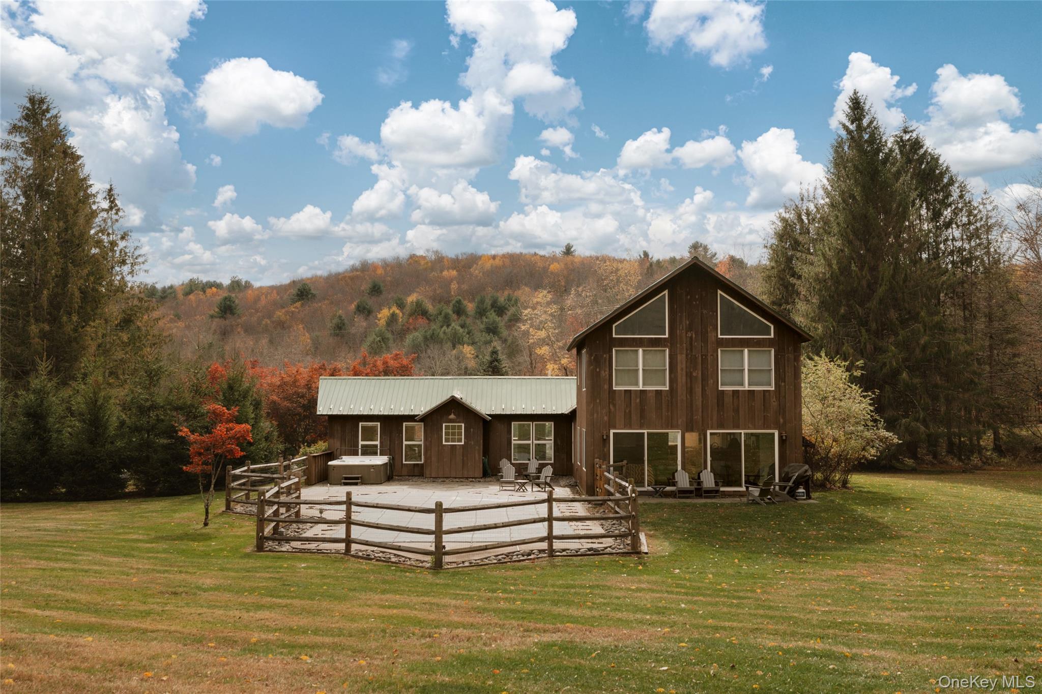 7775 State Rte 55 Neversink, NY 12765 - Photo 2 of 46 a front view of a house with a yard