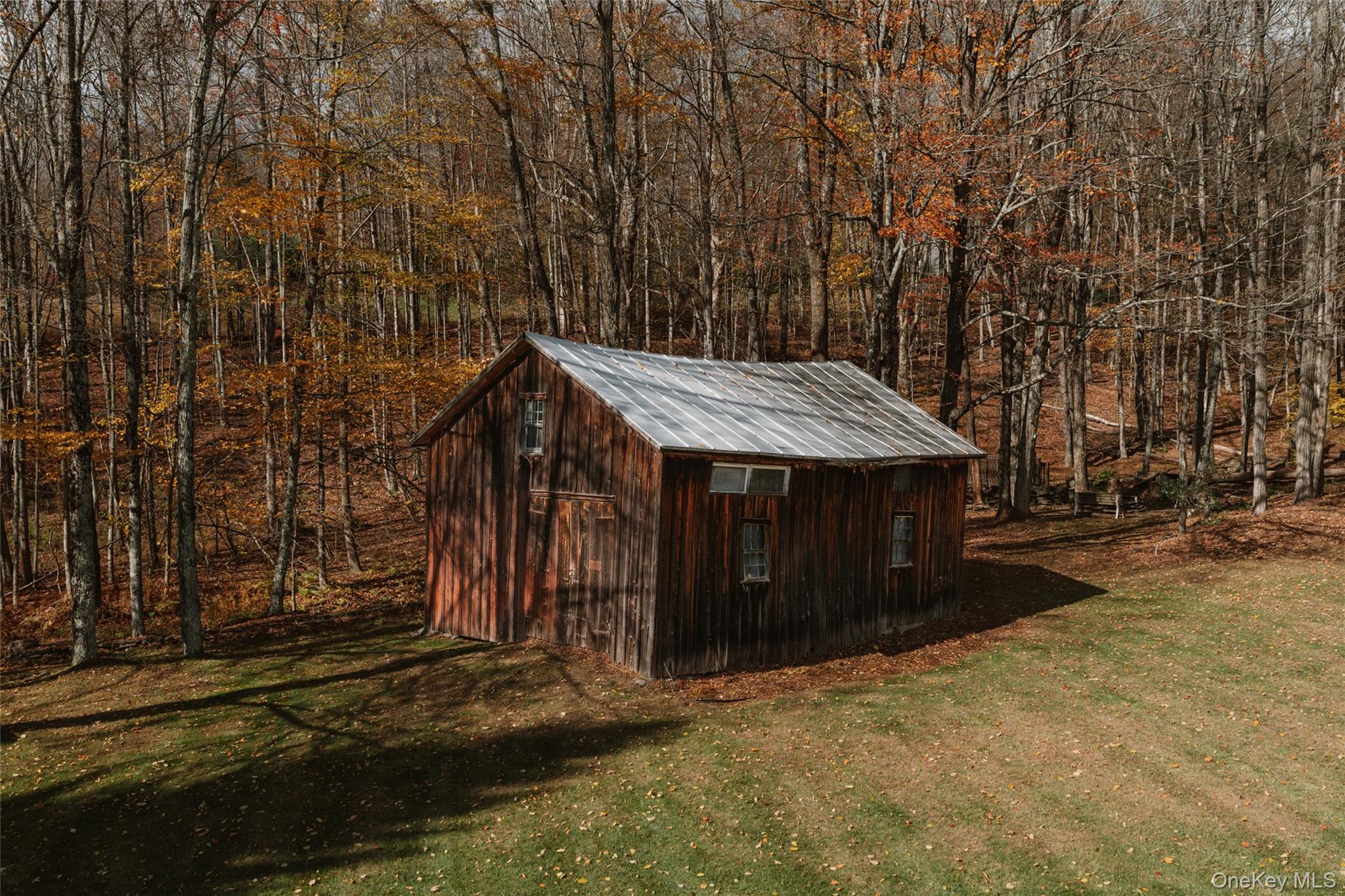 7775 State Rte 55 Neversink, NY 12765 - Photo 43 of 46 a view of a house with backyard and trees