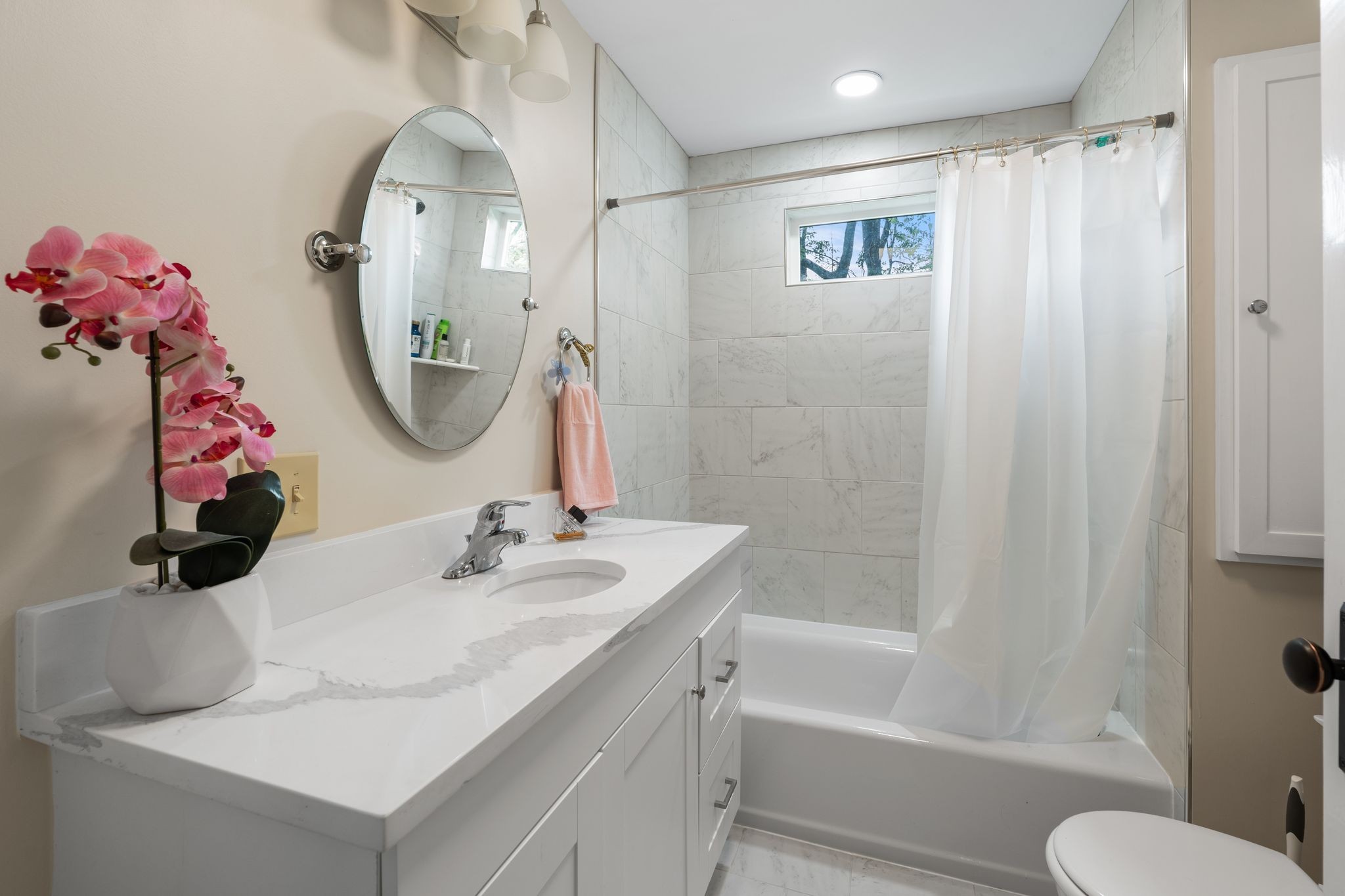 4519 Murfreesboro Road Franklin, TN 37067 - Photo 15 of 51 a bathroom with a sink vanity mirror toilet and bathtub