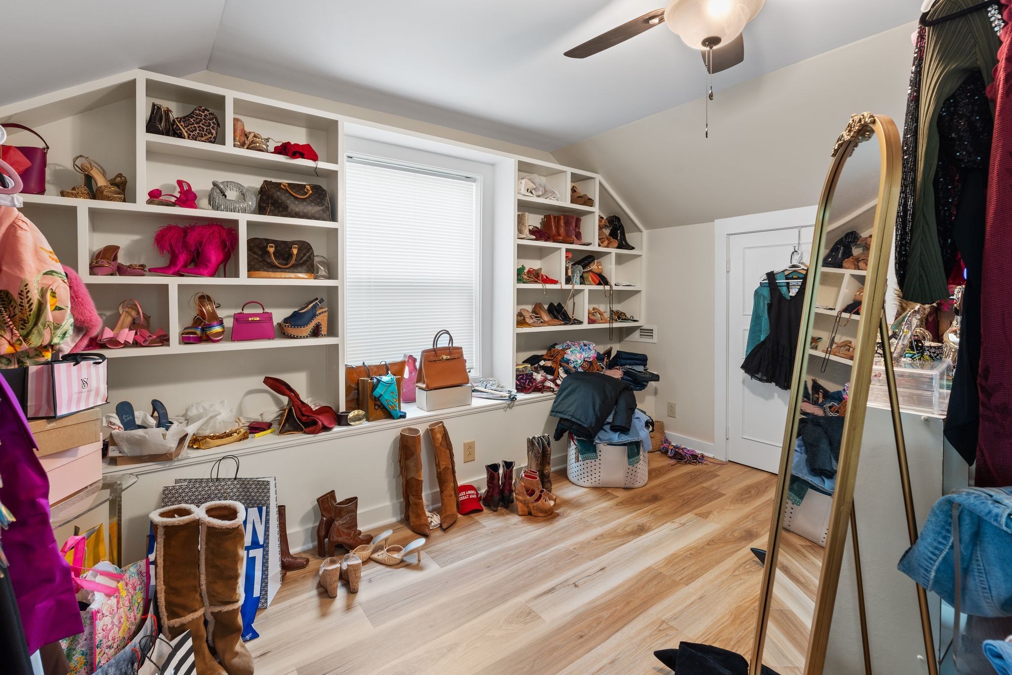4519 Murfreesboro Road Franklin, TN 37067 - Photo 18 of 51 a view of walk in closet with clothes and shoes