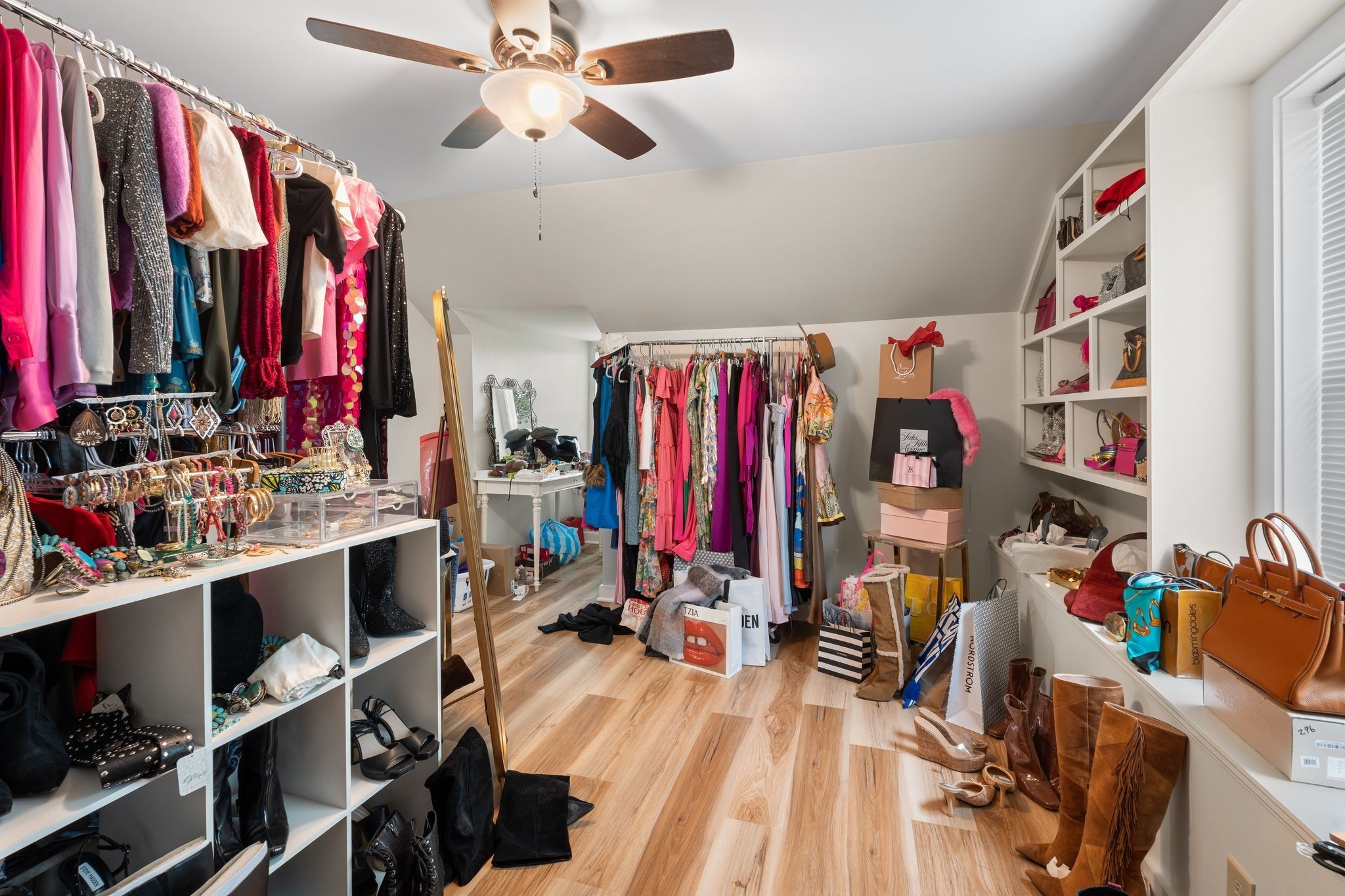 4519 Murfreesboro Road Franklin, TN 37067 - Photo 19 of 51 a view of walk in closet with clothes and shoes