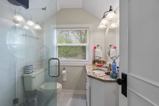 a very nice looking dining room with a window