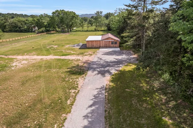 a view of a lake with a yard