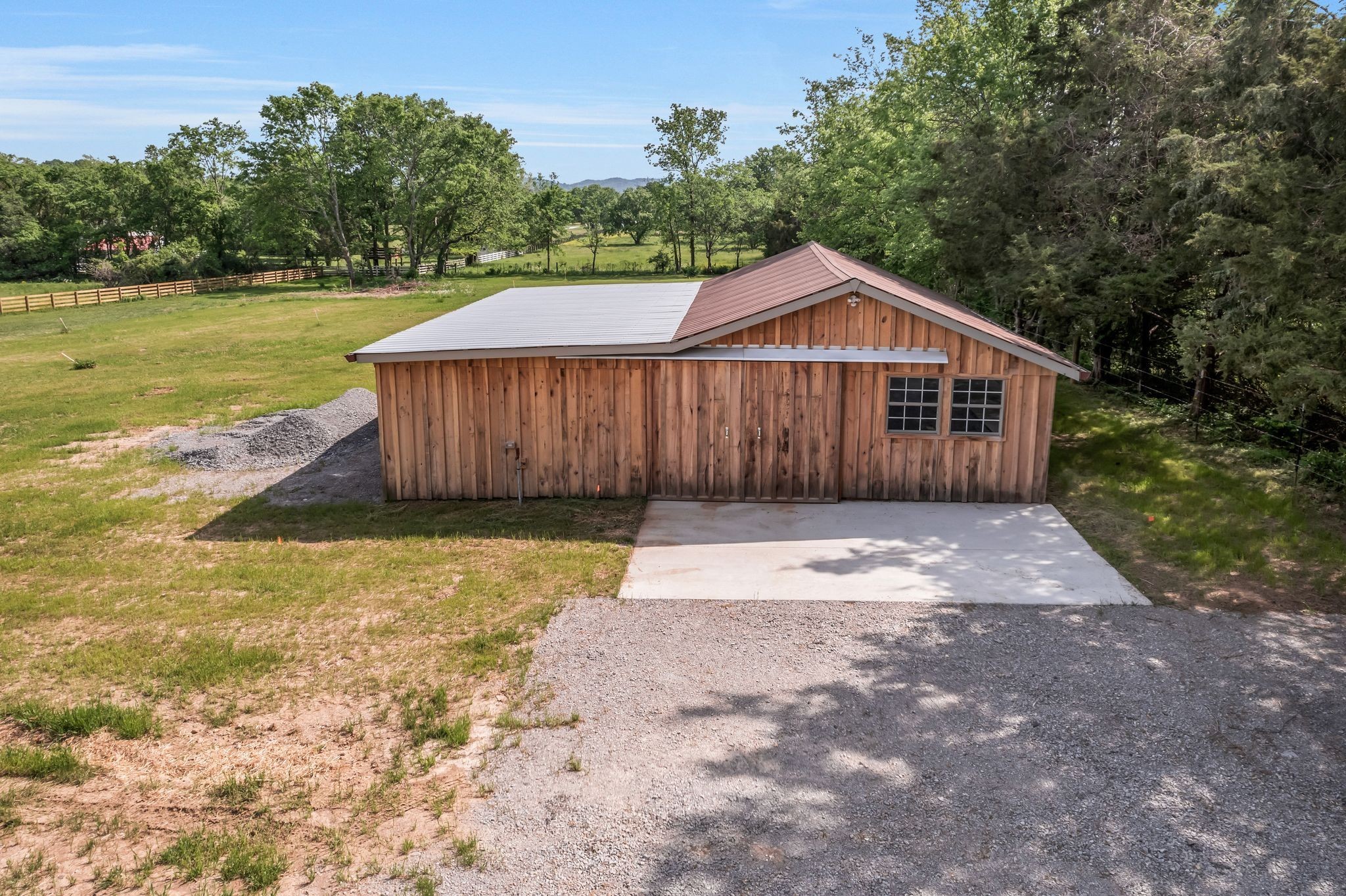 4519 Murfreesboro Road Franklin, TN 37067 - Photo 34 of 51 a view of a wooden house with a yard