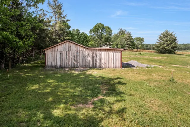a view of a back yard of the house