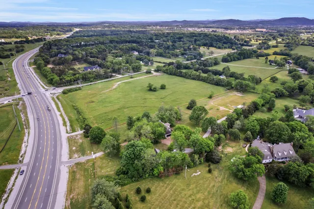 a view of an ocean and a mountain