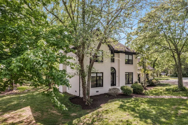 a view of a yard with of trees