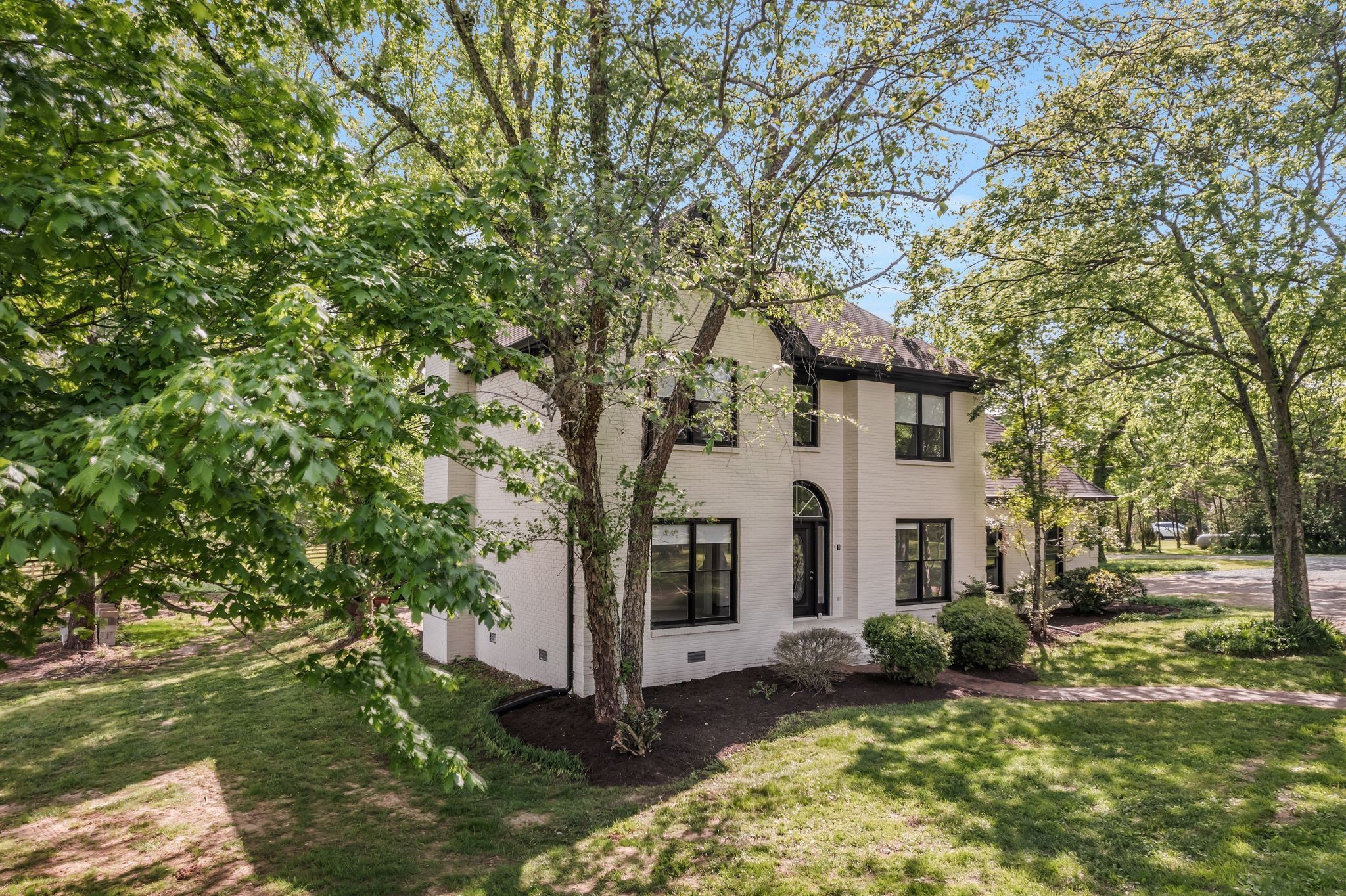 4519 Murfreesboro Road Franklin, TN 37067 - Photo 49 of 51 a front view of a house with a yard