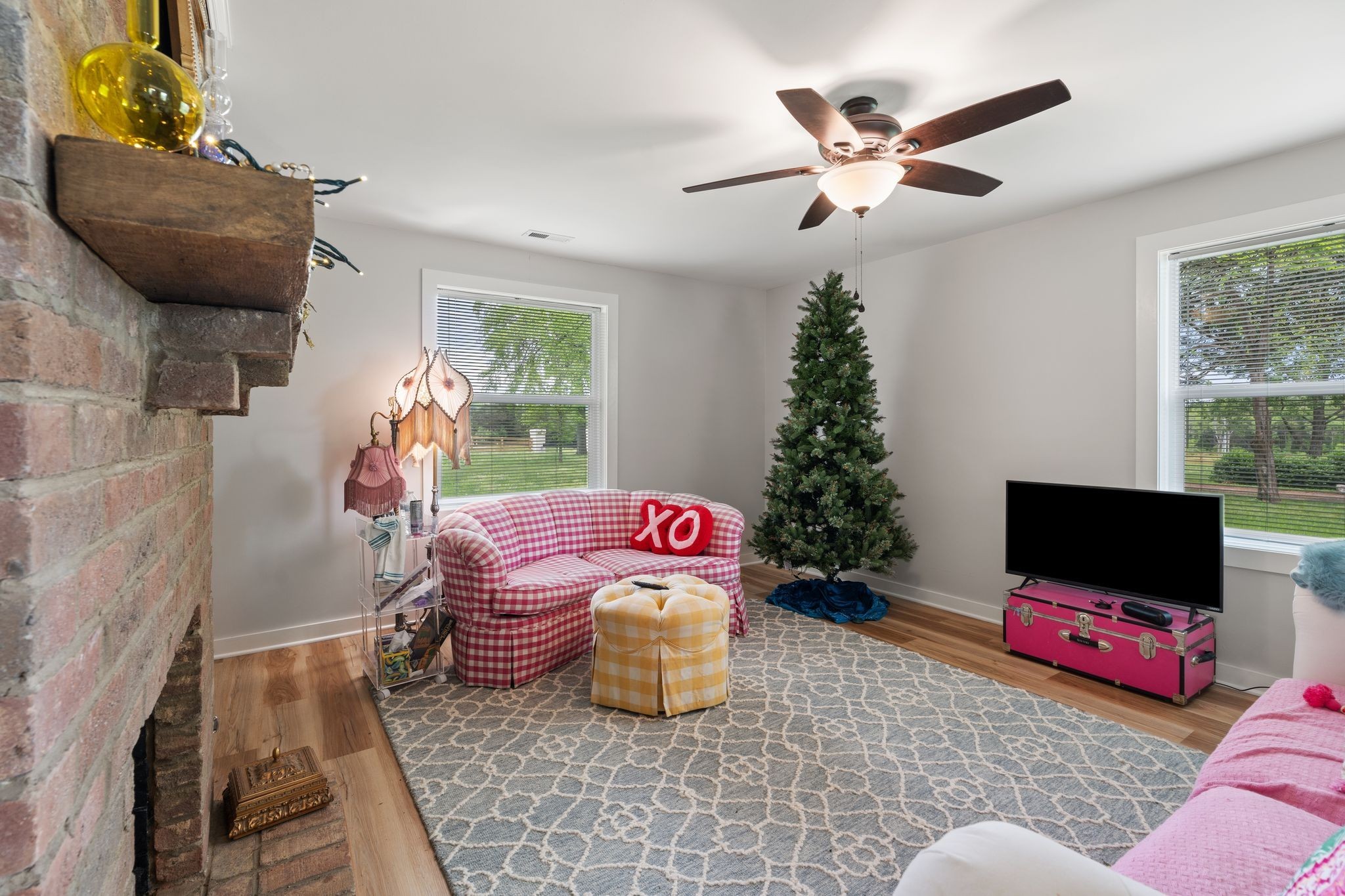 4519 Murfreesboro Road Franklin, TN 37067 - Photo 10 of 51 a living room with furniture and a flat screen tv
